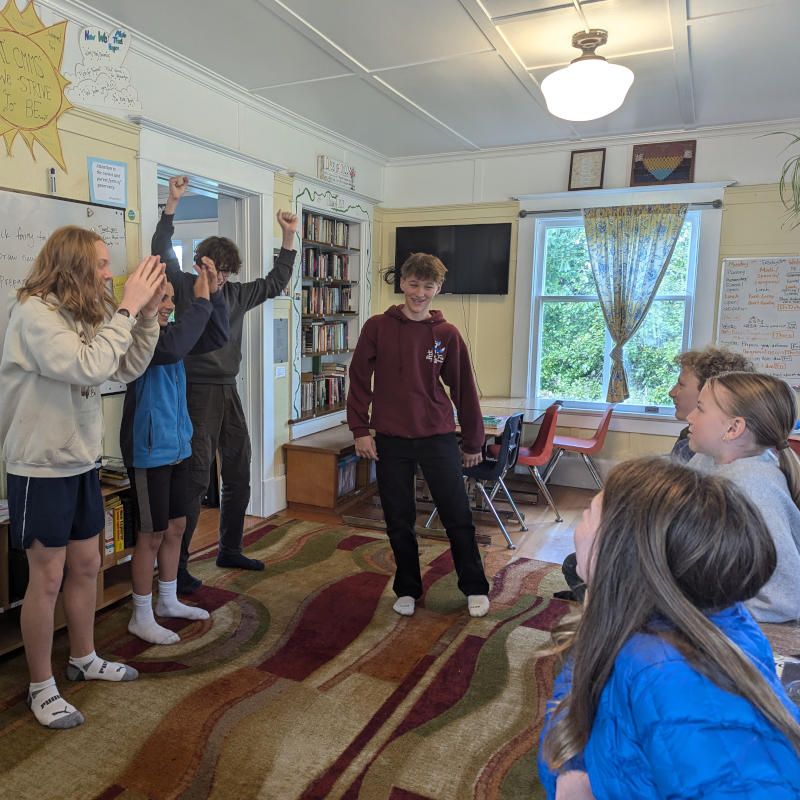 Students acting out a scene in the classroom