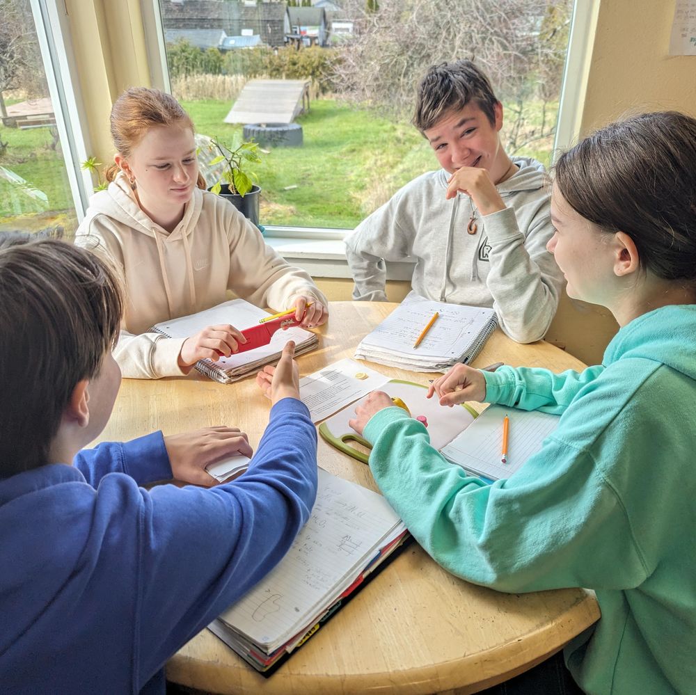 Students working together around a table